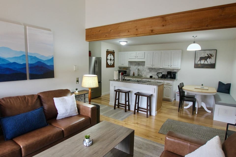 Living room and Kitchen, with pull out sofa bed and all the kitchen appliances and utensils you need.