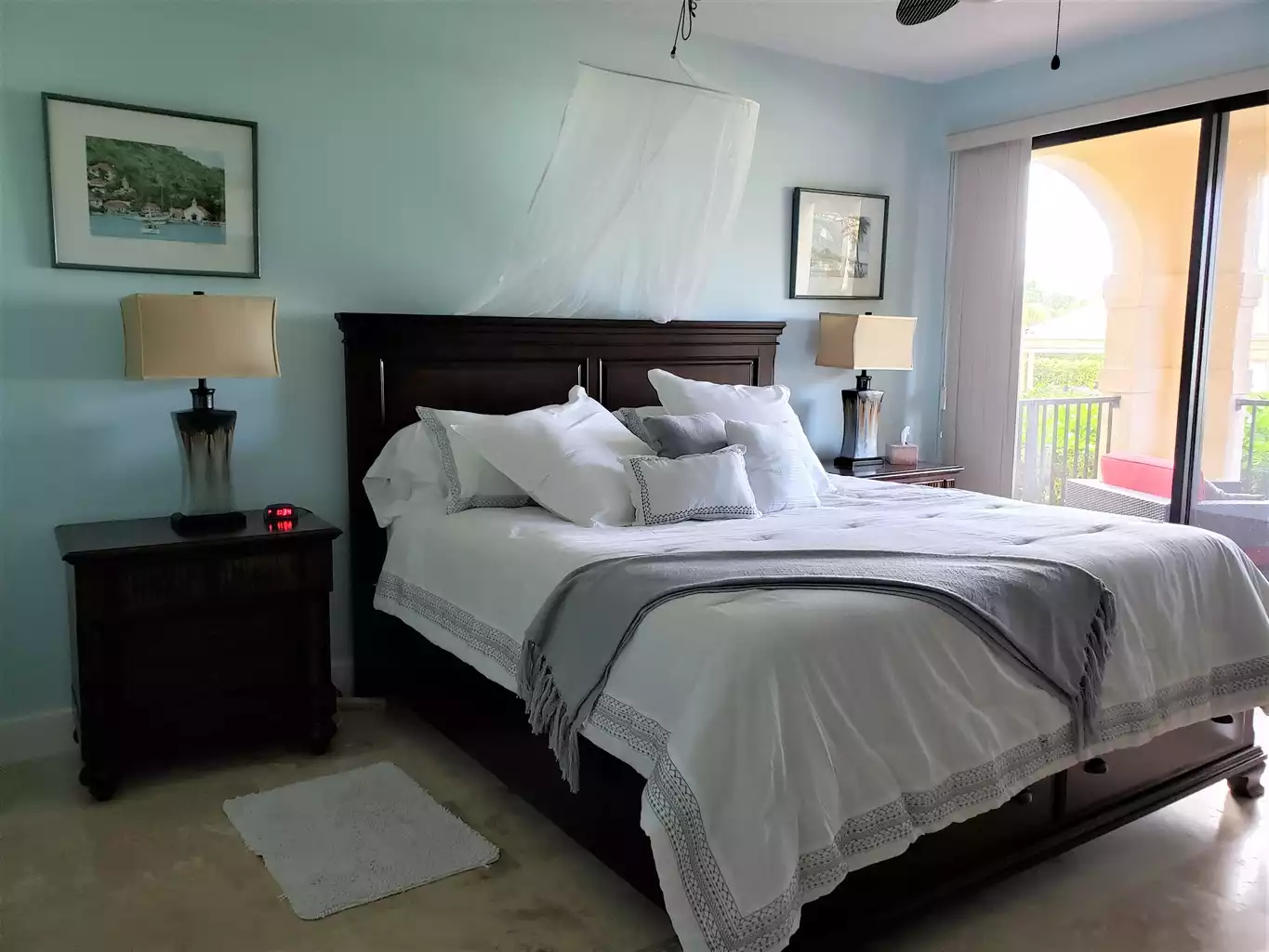 Enjoy the view of the beach from the king size bed in the master bedroom. - Dolphin's Paradise at Pelican Cove - Christiansted