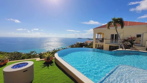 Magnificent ocean views above Morningstar beach (that hosts the Westin/Marriott resorts, just short 2 minute drive below villa). NEW custom luxury 3-4ft infinity pool with tan ledge/loungers, bench seats and pristine salt water system.