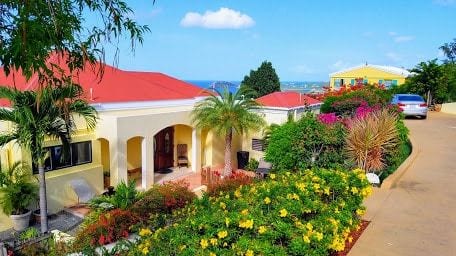 Tropically landscaped villa in St. Thomas US Virgin Islands. Morningstar Studio Villa is 1st floor but perched for the exquisite views (our pictures don't do it justice). Upstairs and downstairs are completely separate with concrete walls