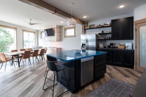 Open concept kitchen/dining with lake views and amenities that would please most home chefs!