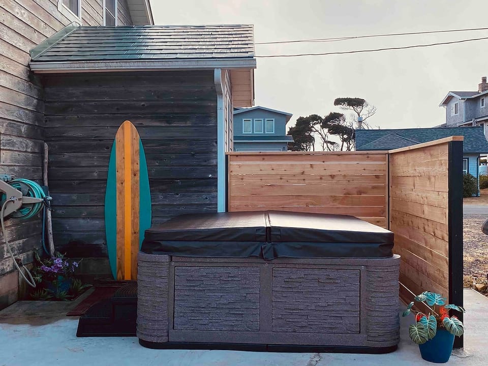 6 person hot tub. Please rinse off first. The yard is open and neighbors can walk by. There is no way around this.