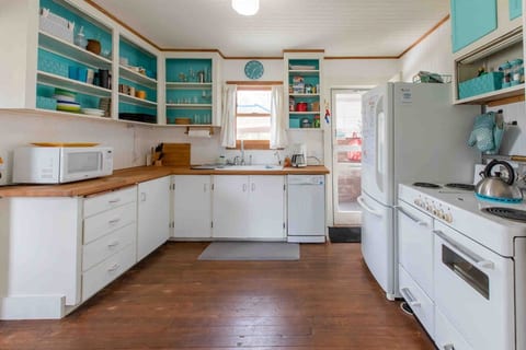 Kitchen fully stocked with items to cook for large family gatherings.