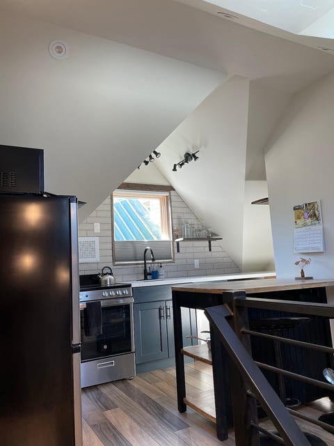 Stainless steel appliances in the newly renovated kitchen. Perfect for 2 with counter height table and all the kitchen utensils you’ll need!
