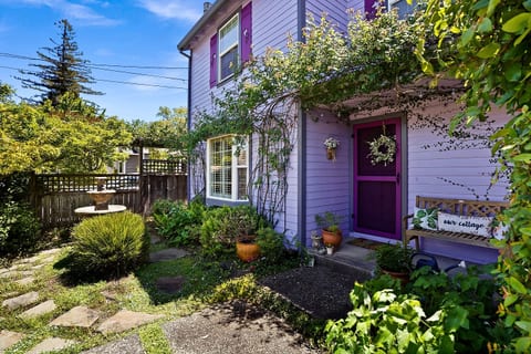 Charming front yard with a peaceful fountain, creating a warm welcome as you arrive.