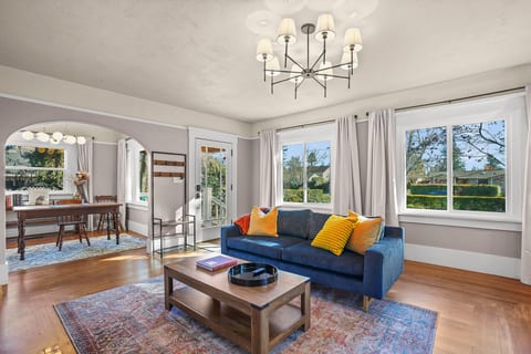 Relax in the inviting living room, complete with comfortable seating and a Smart TV for streaming your favorite movies and shows. It's the perfect place to unwind, gather with family and friends, or enjoy a cozy night in.