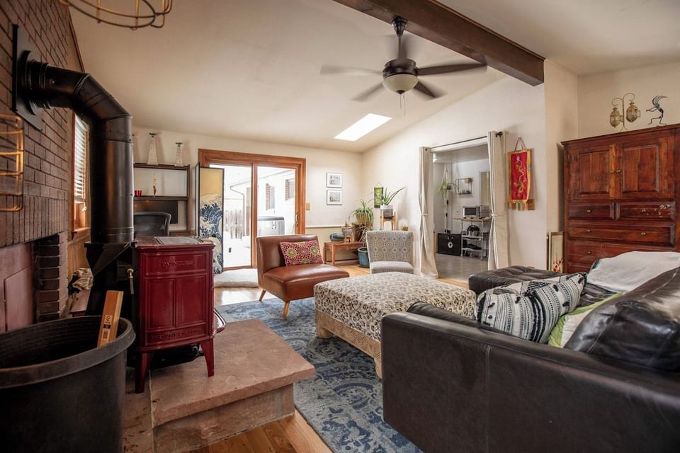 Great room looking into kitchen and onto backyard