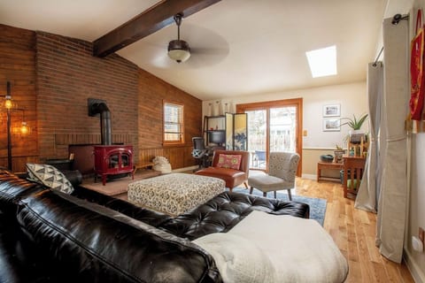 An addition to the original home, this space has vaulted ceilings and gorgeous new wood floors.