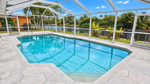 Talita | Canal Home, Heated Pool & fanced Yard
