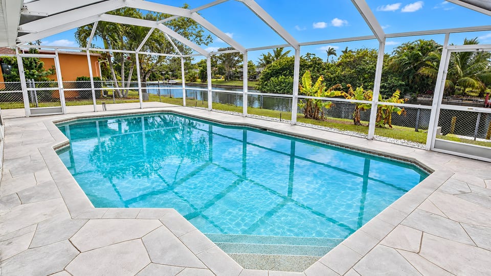 Talita | Canal Home, Heated Pool & Fenced Yard - Cape Coral