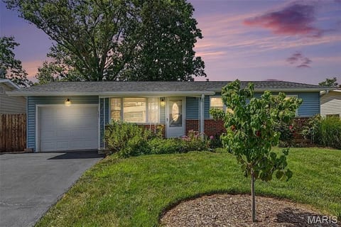 Modern South County retreat with fenced yard image 1