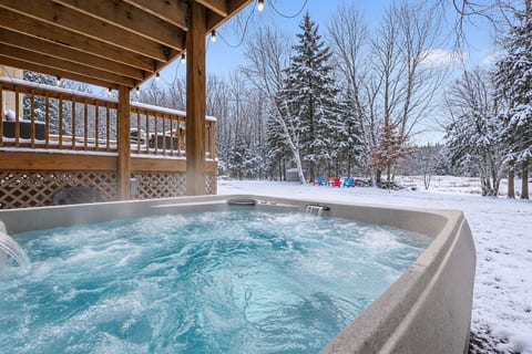 Hot Tub Retreat: Unwind in our bubbling hot tub surrounded by nature's tranquility!
