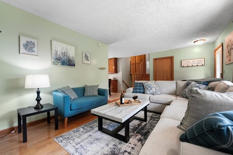 Living Room: Unwind in style amidst vibrant decor and plush seating—perfect for memorable evenings!