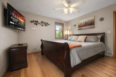 Main Bedroom: Relax in style with a king bed, modern decor, and beautiful nature views!