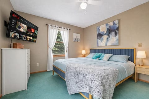 Master Bedroom: Bright retreat with king bed, airy windows, and modern decor awaits your stay!
