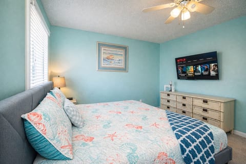 Bedroom with King Bed and Flat TV Screen