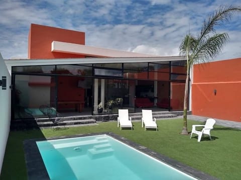 Heated pool and beds in the garden for your rest