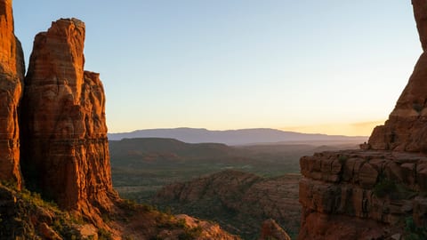 Stunning red rock canyon views with glowing desert sunsets