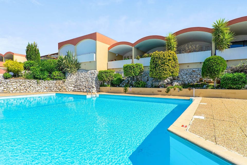 Residential swimming pool with large pool and paddling pool