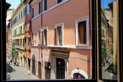 the view from the windows. We are in the hearth of Trastevere exactly in Via della Scala 6