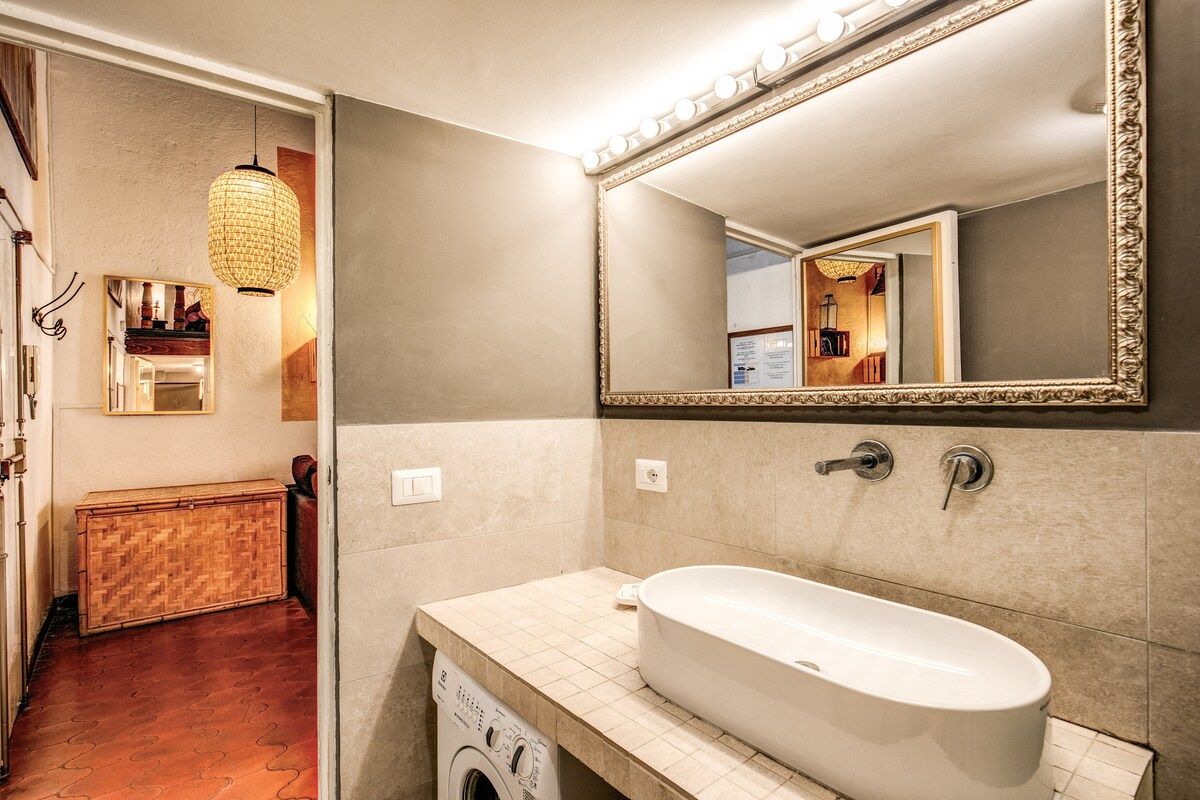 the bathroom with washing machine