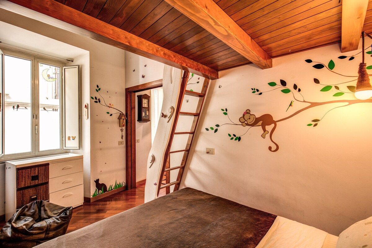 The bedroom number 2 with a double bed and one more double bed on the mezzanine