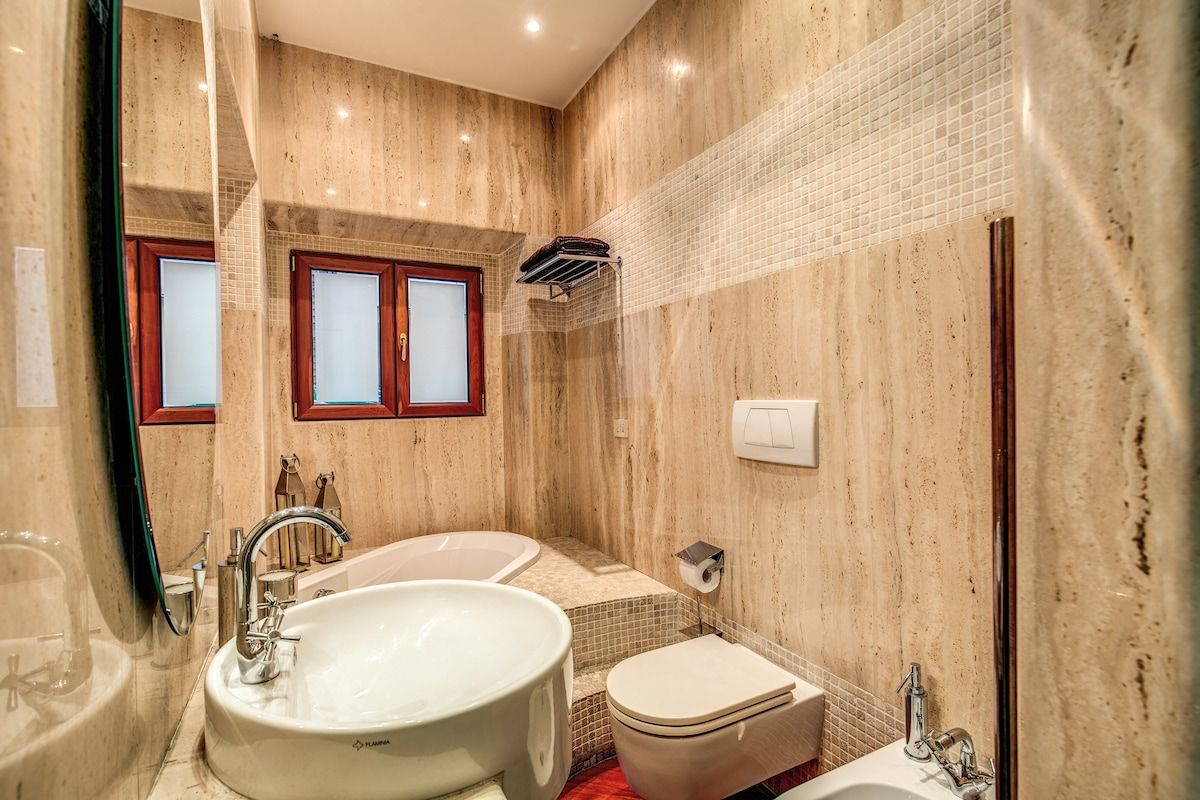 Bathroom number 2 with bathtub and shower