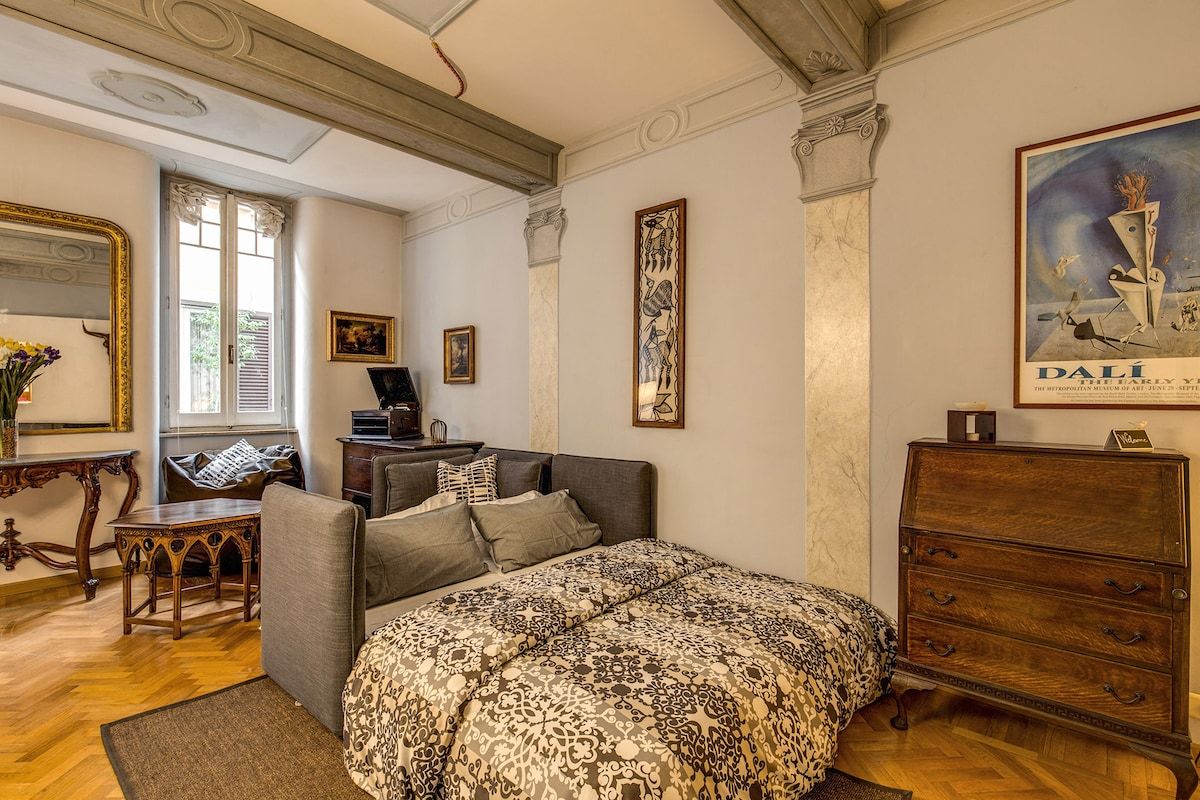 the sofa bed in the living room can be transformed into two single beds or a double bed