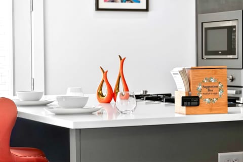 Modern kitchen island with stylish decor and dining setup