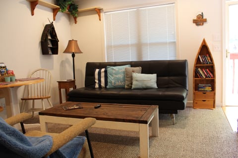A comfortable spot to slow down and relax, with cozy seating, books to enjoy and charming lake-inspired touches throughout.