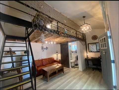 Beach theme Industrial Loft with Home Theater image 1