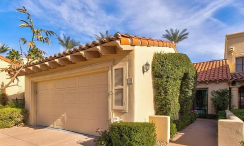 Exterior of condo, 2 car garage
