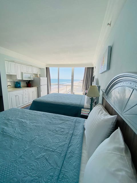 Fully remodeled studio with two queen size beds. A few things to mention, new mattresses, flooring, furniture, painting.
Lay on the bed and watch the spectacular beach.