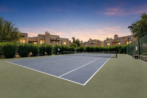 Private community tennis court with beautiful sunset views