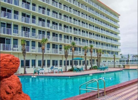 Building exterior with private on-site parking for guests.
