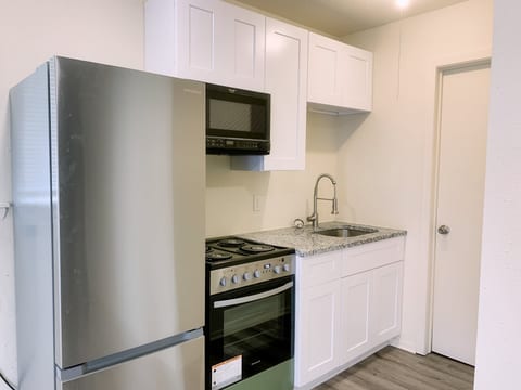 2 Bed Hideaway | Private Entry • Garage • Yard