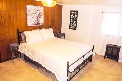 Queen size bed with electric fire place & alarm clock