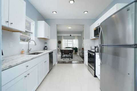 Enjoy the convenience of our well-appointed kitchen, equipped with modern appliances, a dishwasher, and ample counter space for meal preparation.