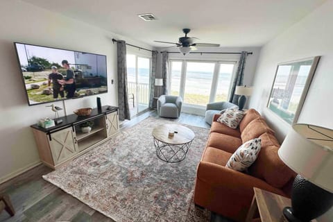Unwind in the warm ambiance of our beautifully appointed living room, where relaxation is guaranteed.