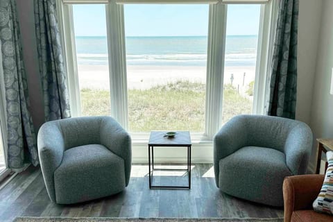 Unwind in the warm ambiance of our beautifully appointed living room, where relaxation is guaranteed.