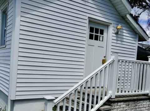 A Warm Welcome Awaits: Step through our Inviting Front Door and Experience Hospitality at Its Finest

