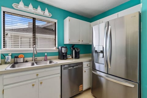 Cook and dine in style with a fully-equipped kitchen featuring modern stainless steel appliances. Enjoy coffee from your choice of two coffee makers each morning.