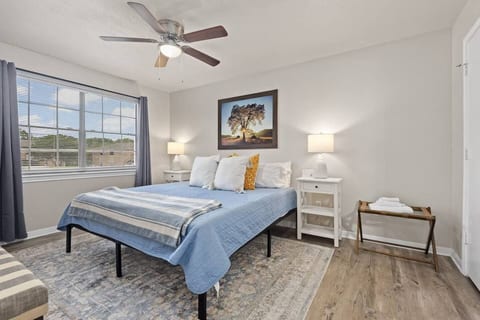 Spacious bedroom with fresh linens, and natural light for restful nights.