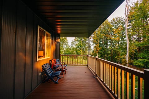 Relax in one of the wooden chairs with your favorite drink while chatting and watching the kids play outside.