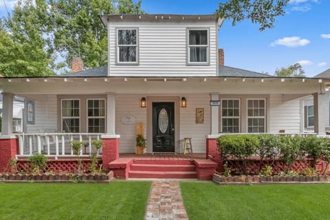 Step onto the front porch and feel true Southern charm. A spacious spot with a classic porch swing and two comfy chairs, perfect for morning coffee or sunset chats. Soft evening lights make it the ideal place to unwind and enjoy The Whistling Porch.