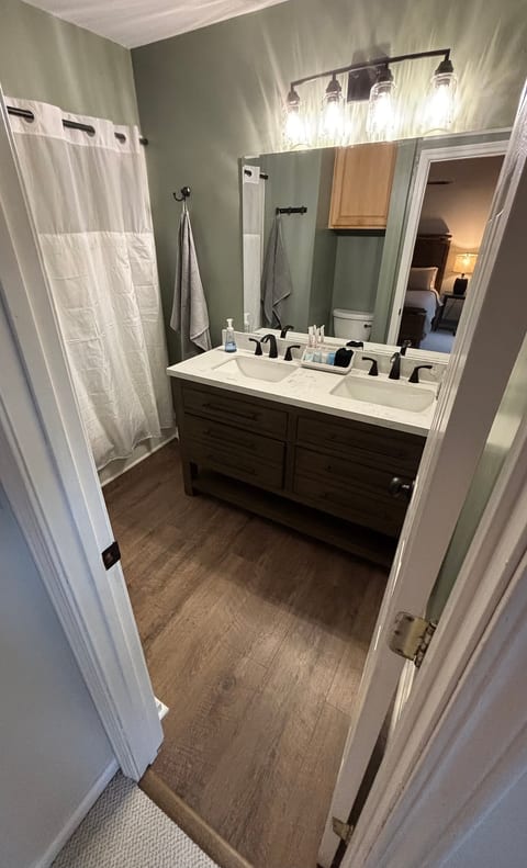 Bright modern bathroom with double vanity and stylish finishes