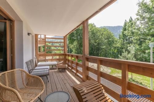 Large sunny terrace with outdoor furniture
