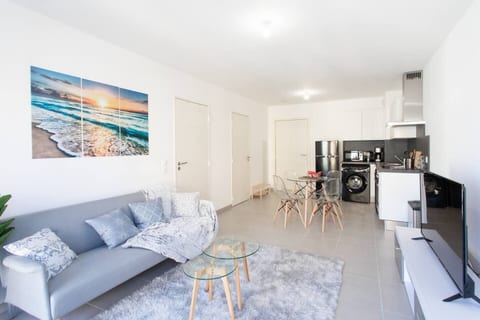 Open-plan living and dining area leading to the fitted kitchen