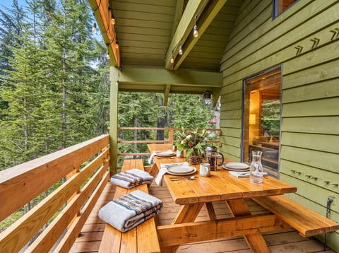 Deck Dining: Enjoy spirited meals surrounded by breathtaking forest views and twinkling lights!