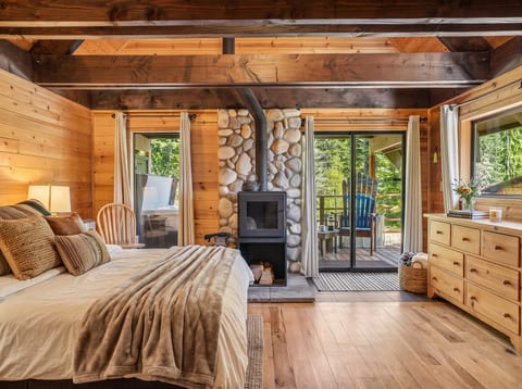 Charming Suite: Enjoy stunning nature views from your private deck while unwinding by the fireplace!